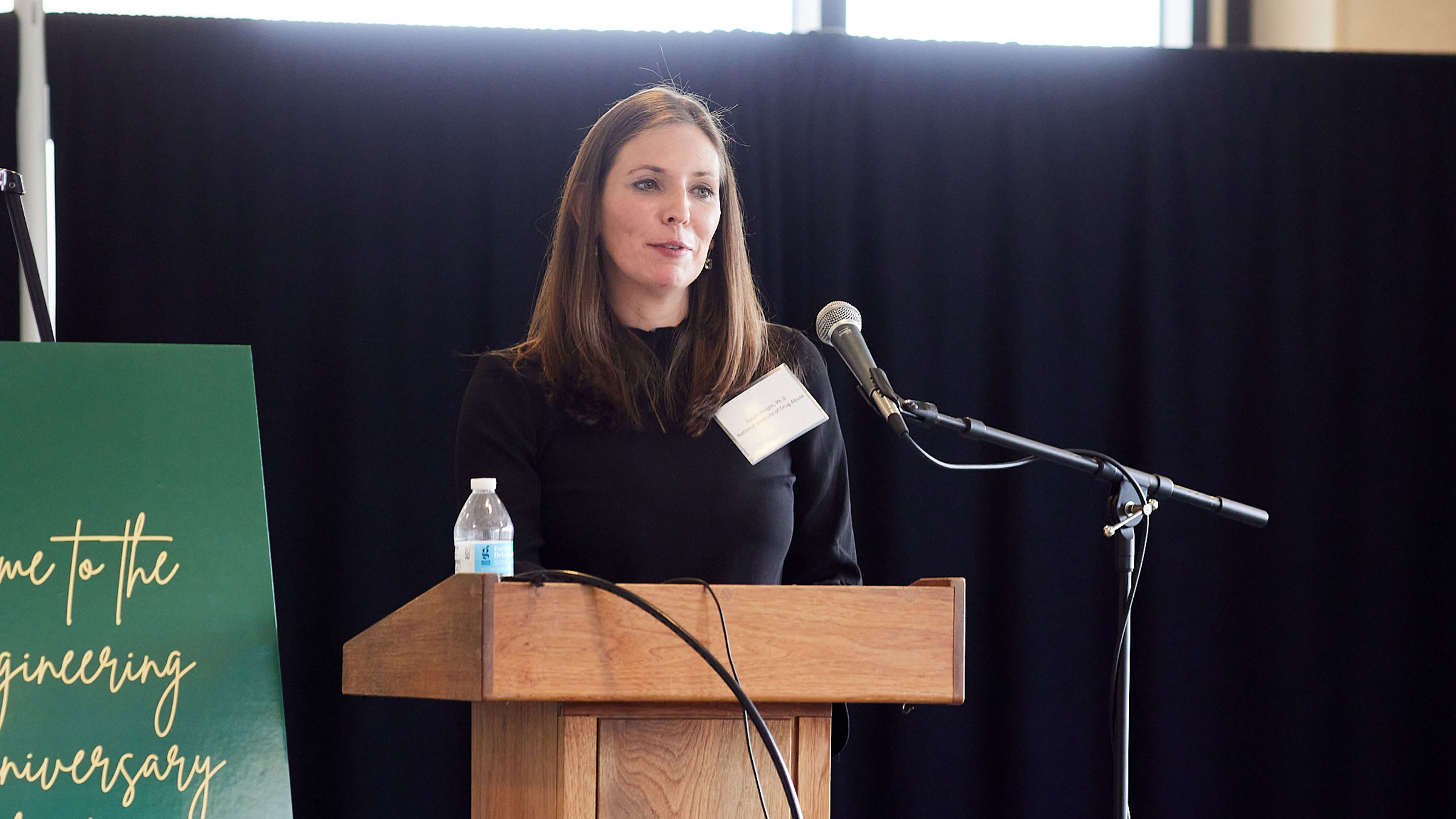 A guest speaker giving a speech at a conference.