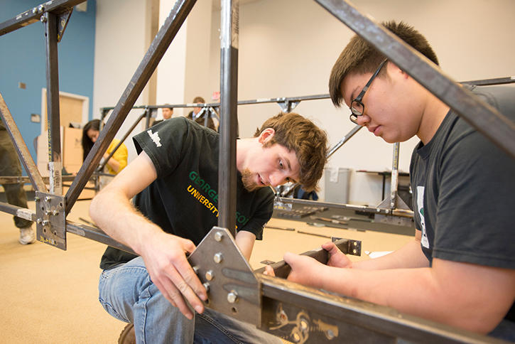 Volgenau Students working in lab.