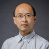 GM SEOR professor Ju Xie wears glasses and a light shirt